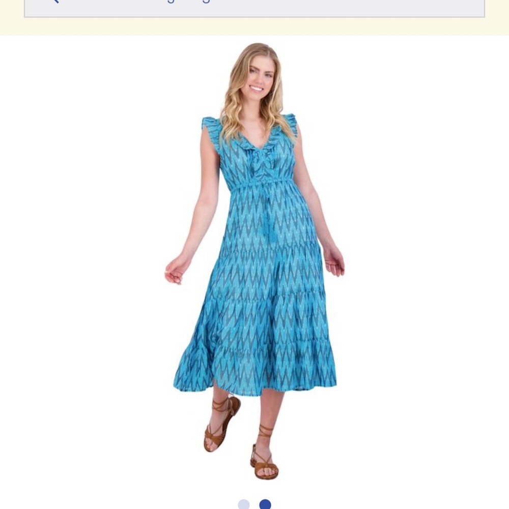 Mer St. Barth Giselle Ikat ruffle sleeve maxi dress in turquoise.